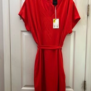 Beautiful tangerine dress from Dilliard’s.  Alex Marie designer.